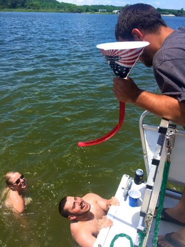 Serving booze to friends in the water in Ocean City, MD.